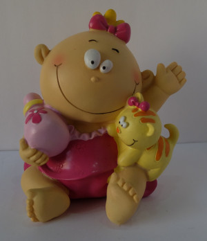 Tirelire bébé souriant fille